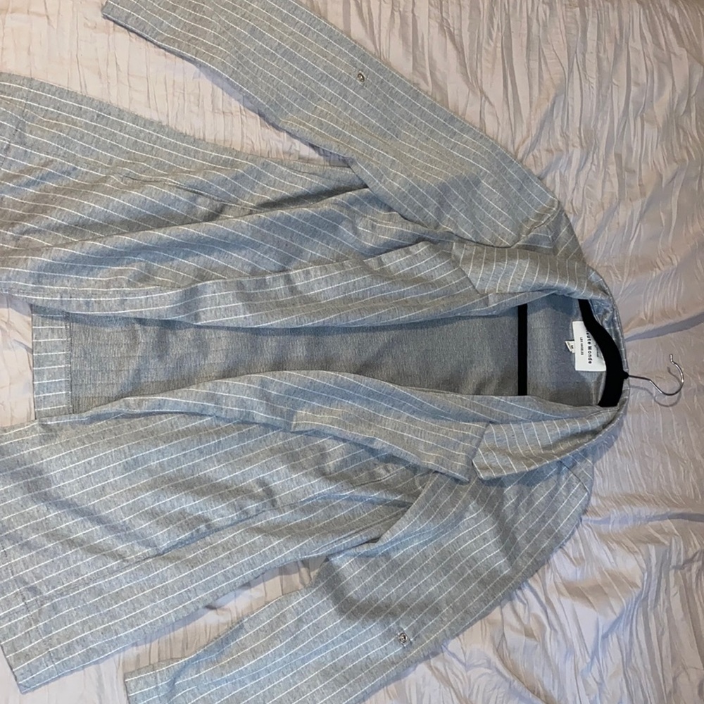 Grey and white jacket.